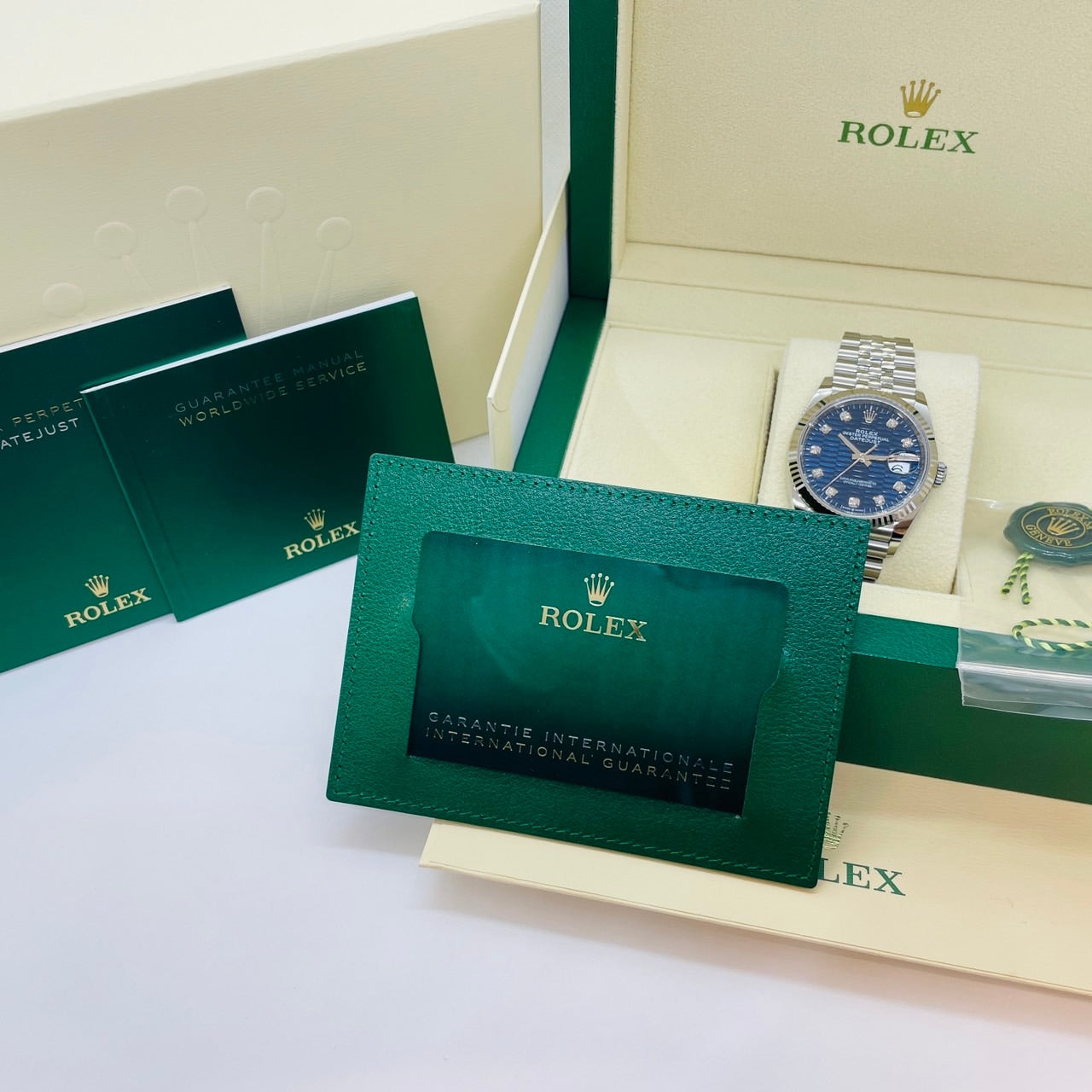 Pre-Owned Rolex Datejust 126234G Fluted Motif Bright Blue