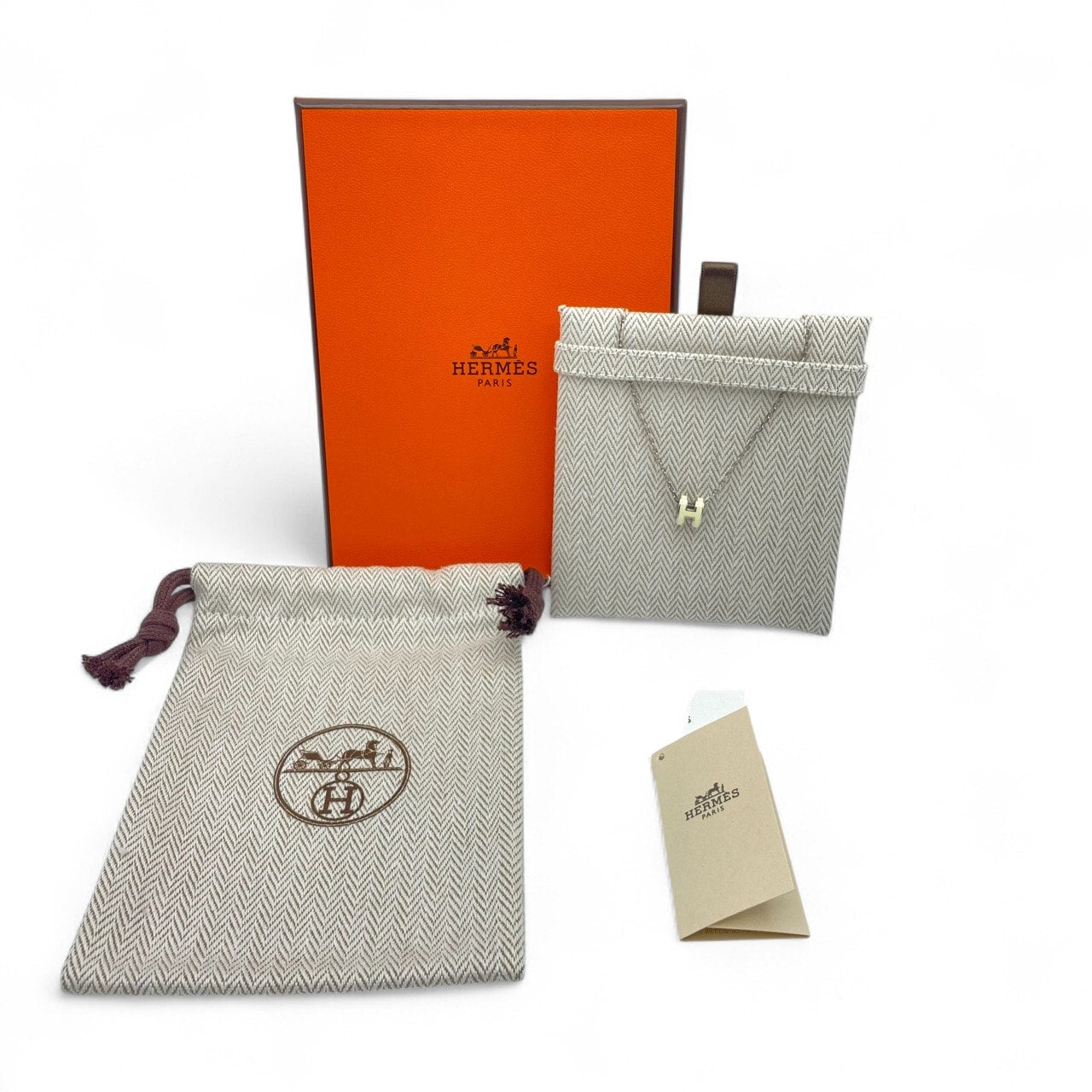 プレオウンドエルメス ポップH ミニ ネックレス アイボリー/メタル シルバー金具