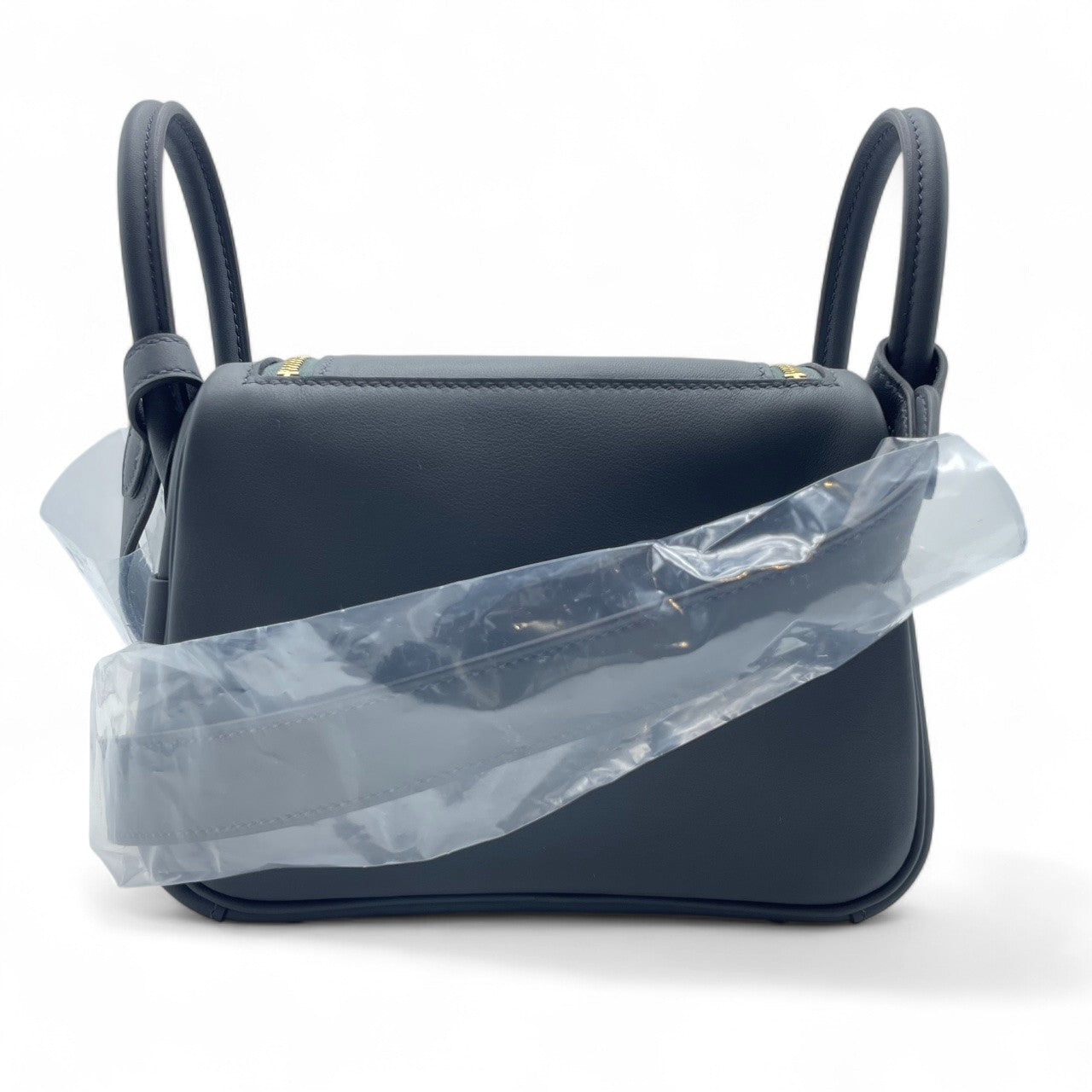 중고 에르메스 린디 미니 20 그리미스티/느와르 스위프트 샴페인 골드 하드웨어 K 스탬프