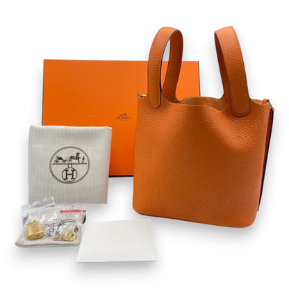 Pre-owned Hermes Picotan Lock PM Orange Taurillon Clemence Gold hardware K stamp