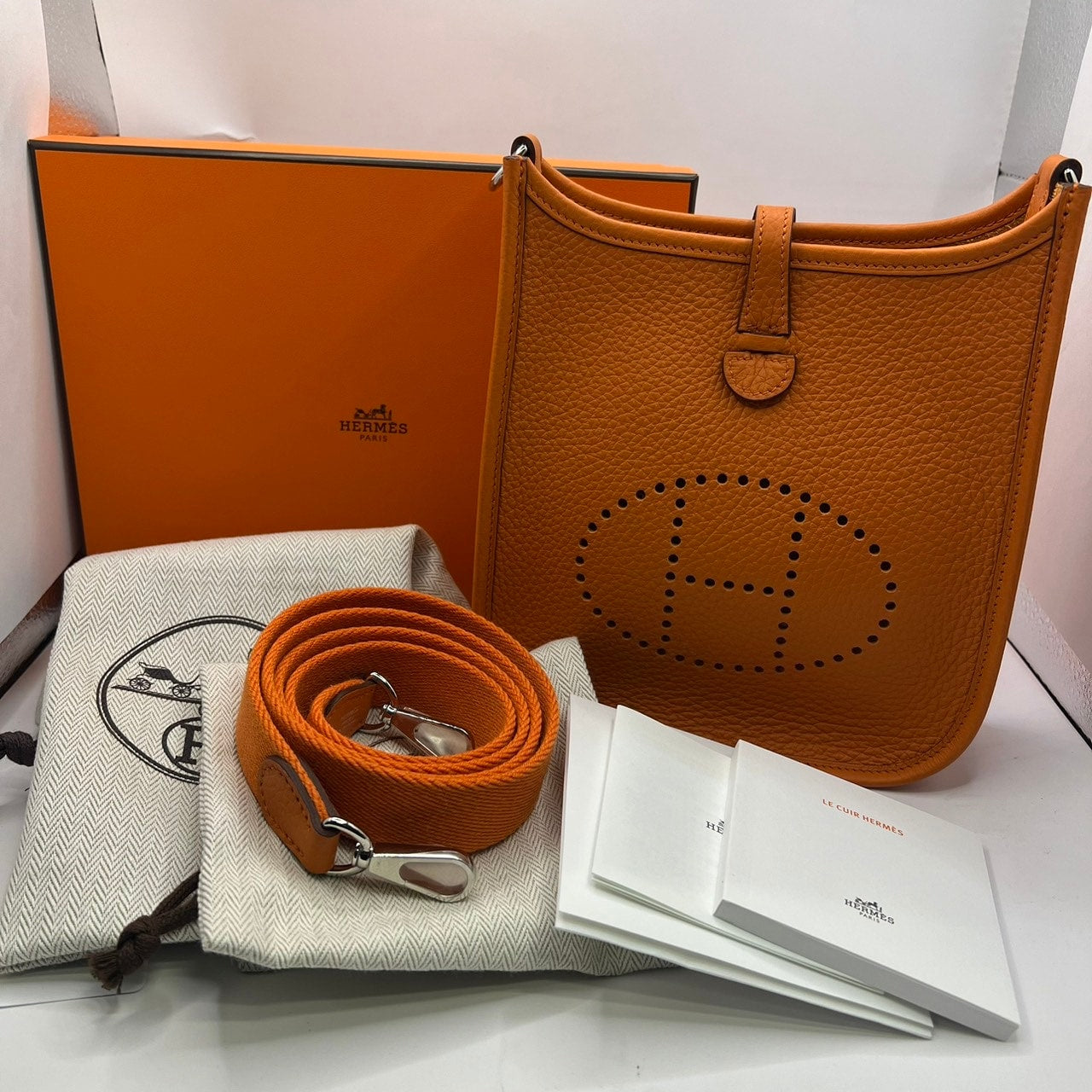 Pre-Owned Hermes Evelyn TPM Torillon Clemence Orange Silver Metal Fittings B Engraved