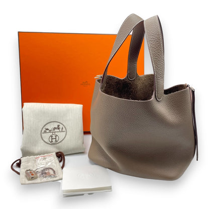 Pre-Owned Hermes Pico Tan Lock MM Etoupe Taurillon Clemence Silver hardware U engraved