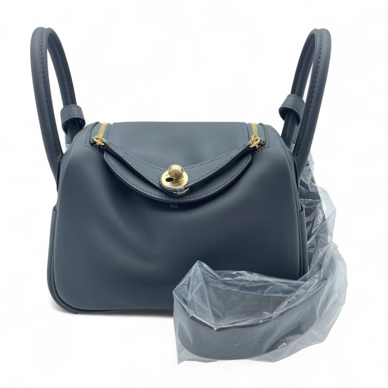 중고 에르메스 린디 미니 20 그리미스티/느와르 스위프트 샴페인 골드 하드웨어 K 스탬프