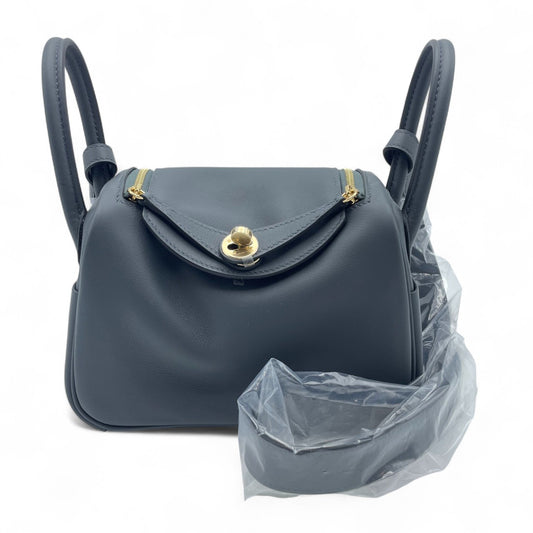 중고 에르메스 린디 미니 20 그리미스티/느와르 스위프트 샴페인 골드 하드웨어 K 스탬프