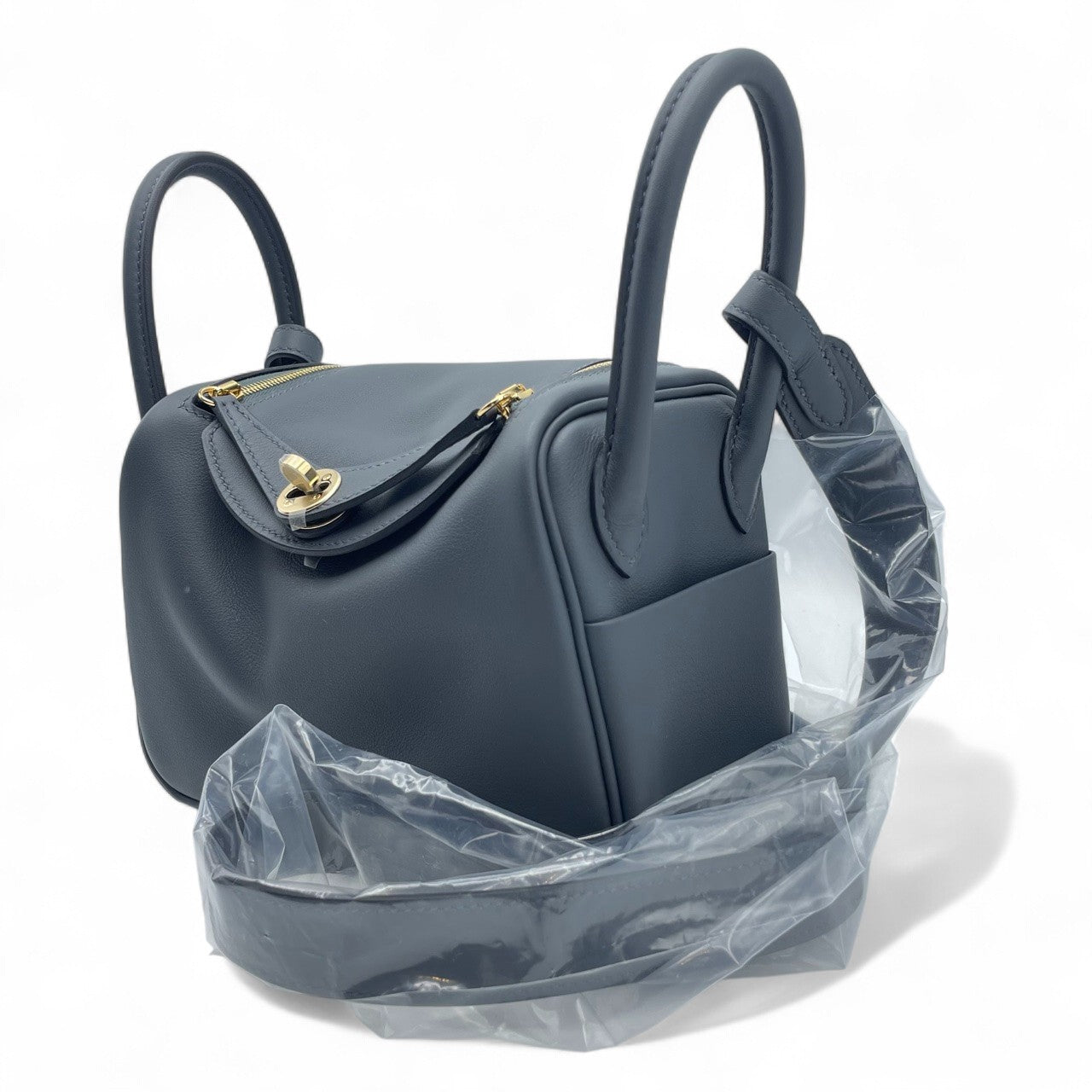 중고 에르메스 린디 미니 20 그리미스티/느와르 스위프트 샴페인 골드 하드웨어 K 스탬프