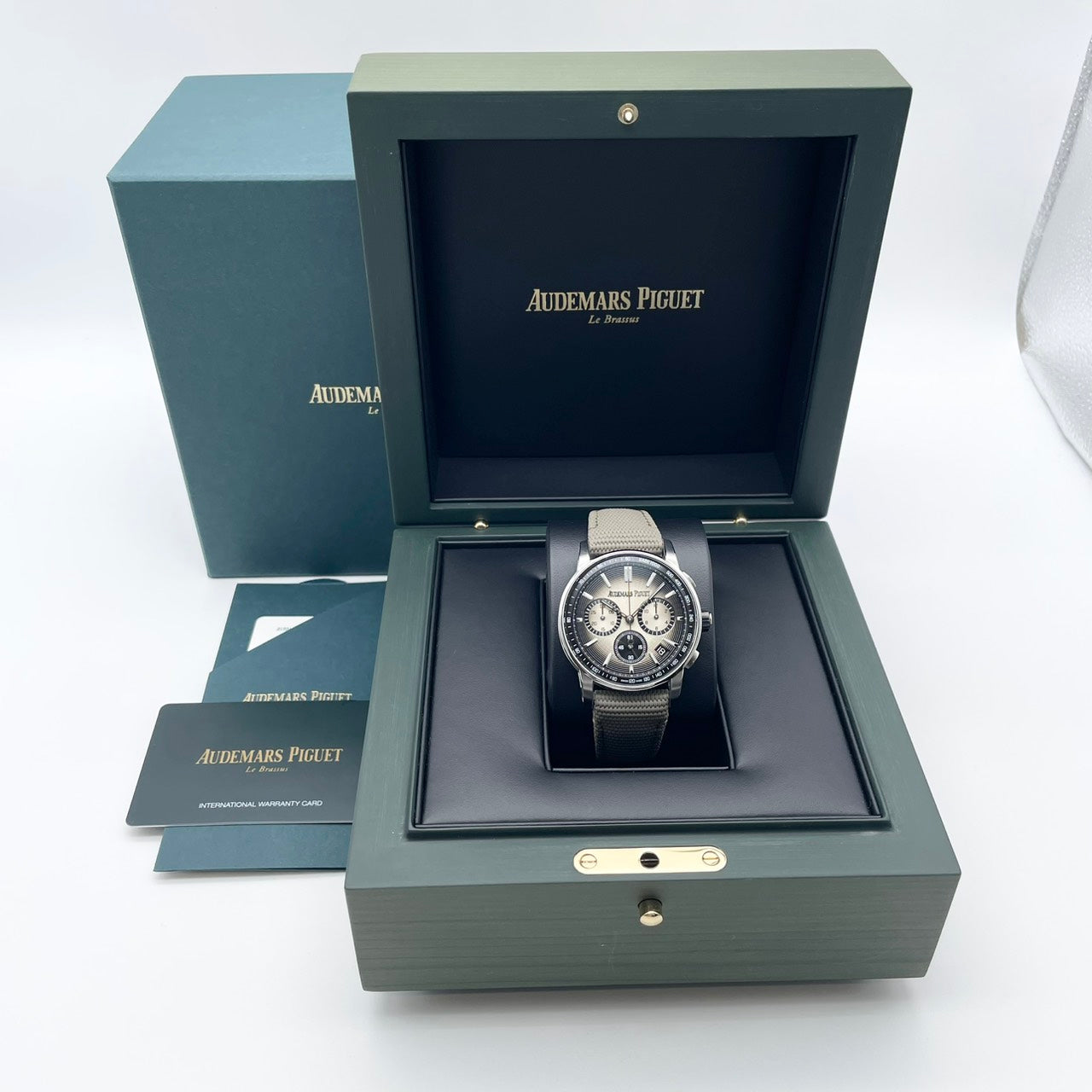 preound odemapige CODE 11.59通过odemapige 26393QT.OO.A064KB.01烟熏米色41mm