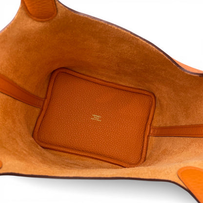 Pre-owned Hermes Picotan Lock PM Orange Taurillon Clemence Gold hardware K stamp