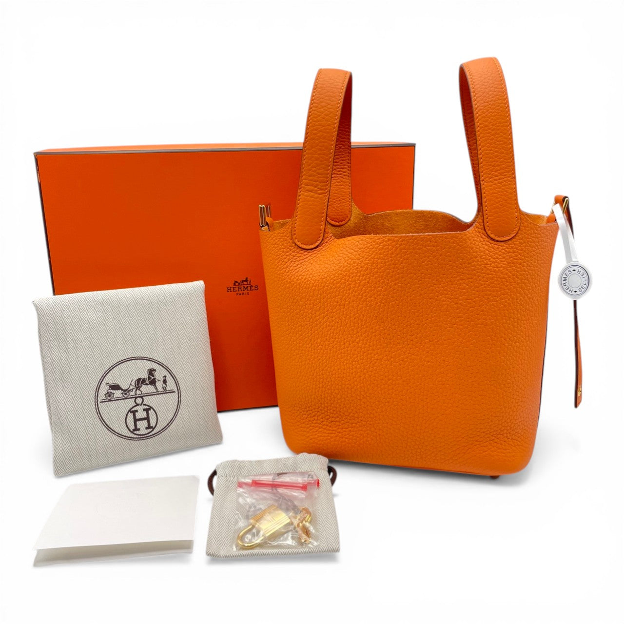 Pre-owned Hermes Picotan Lock PM Orange Taurillon Clemence Gold hardware K stamp